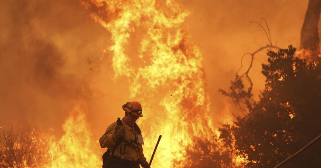 Canyon Fires Force Thousands To Evacuate As Structures Ignite