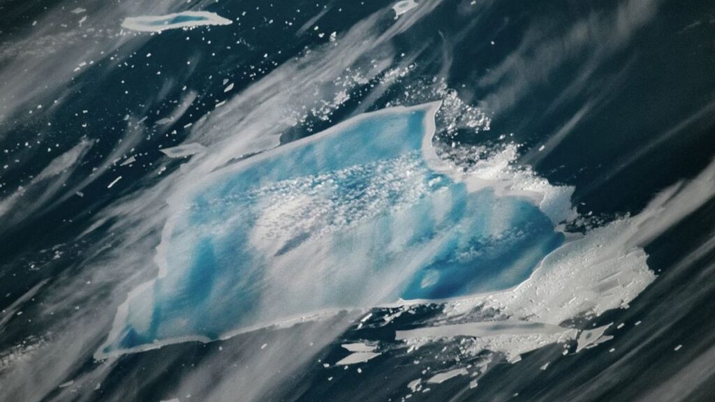 Iceberg Shifts To Stunning Blue Ahead Of Inevitable Collapse