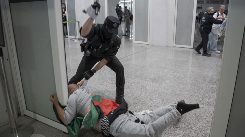 Spanish Police Clash with Gaza Activist Amidst Israel’s Response Spanish Police Clash With Gaza Activist Amidst Israel's Response